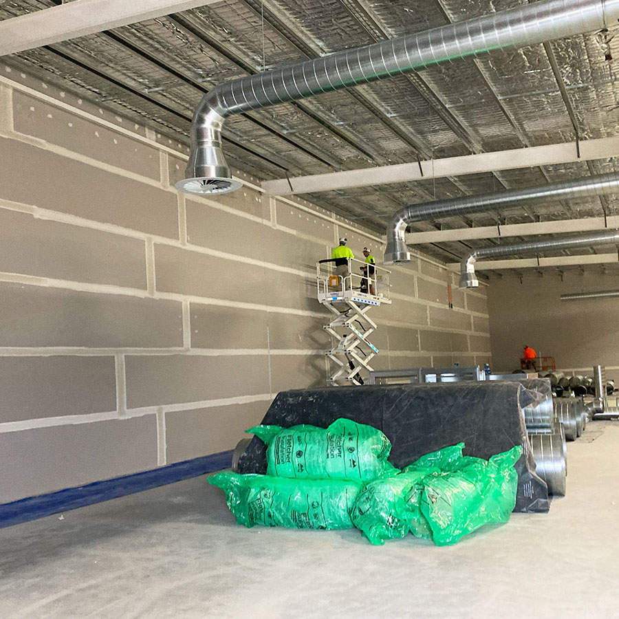 Plastering a commercial warehouse